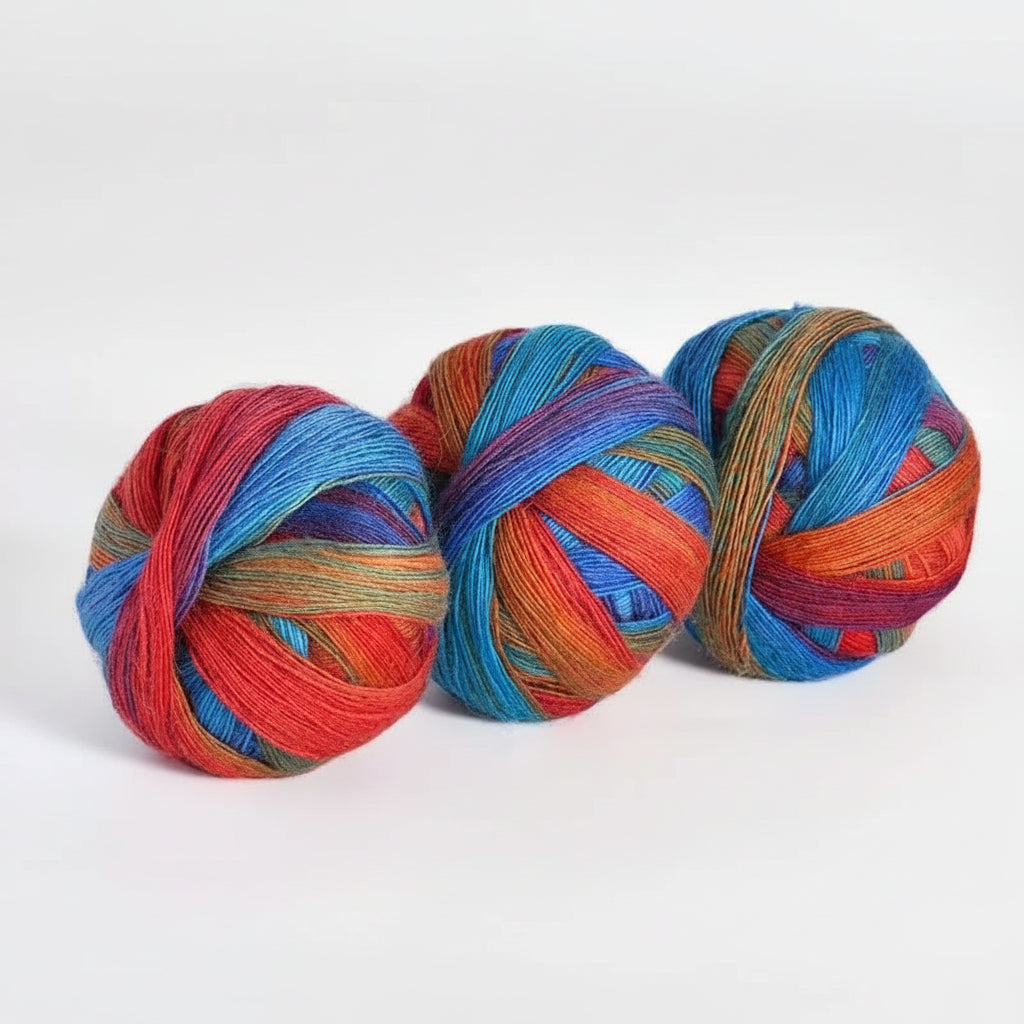 Three skeins of multicolored yarn on a white background with text indicating color code and weight.